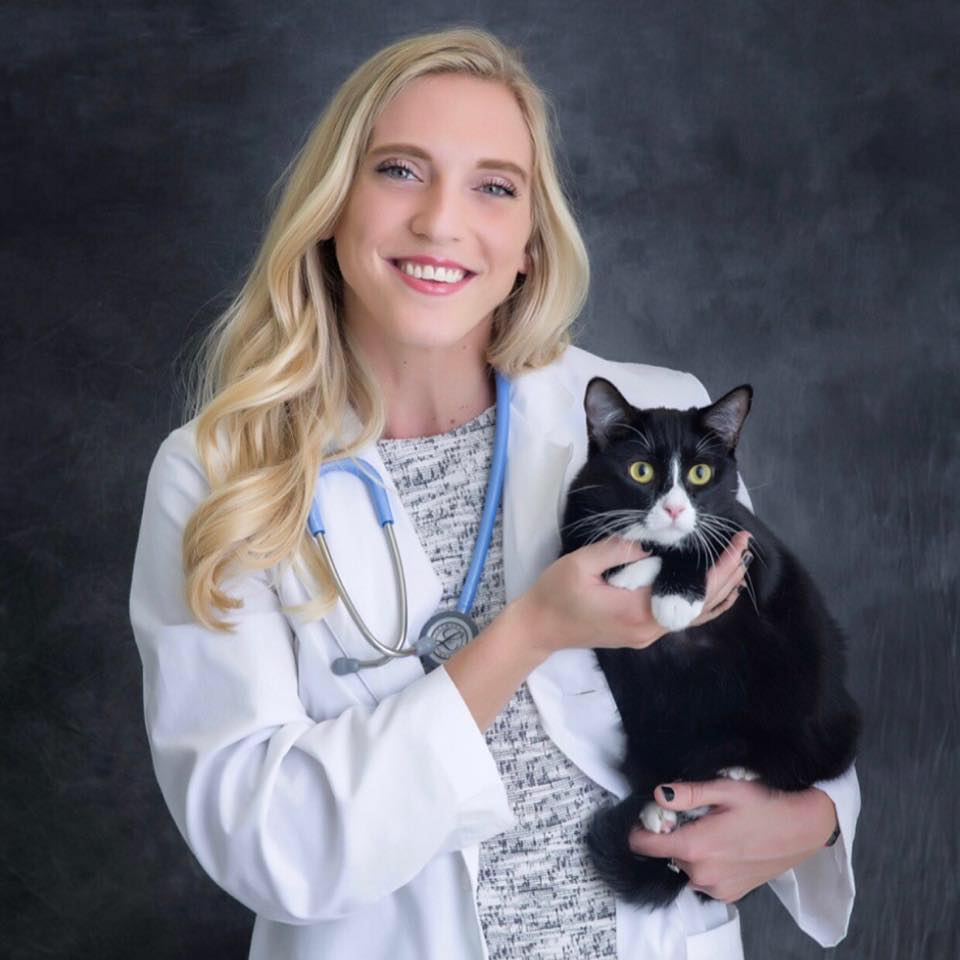 Photo of a vet student named Taylor with her cat Piper